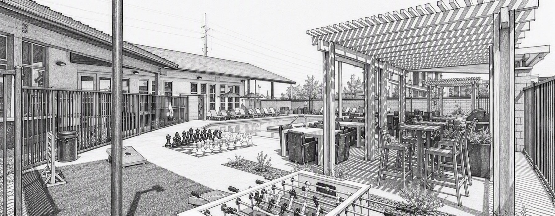 outside courtyard area with games and a nearby pool area